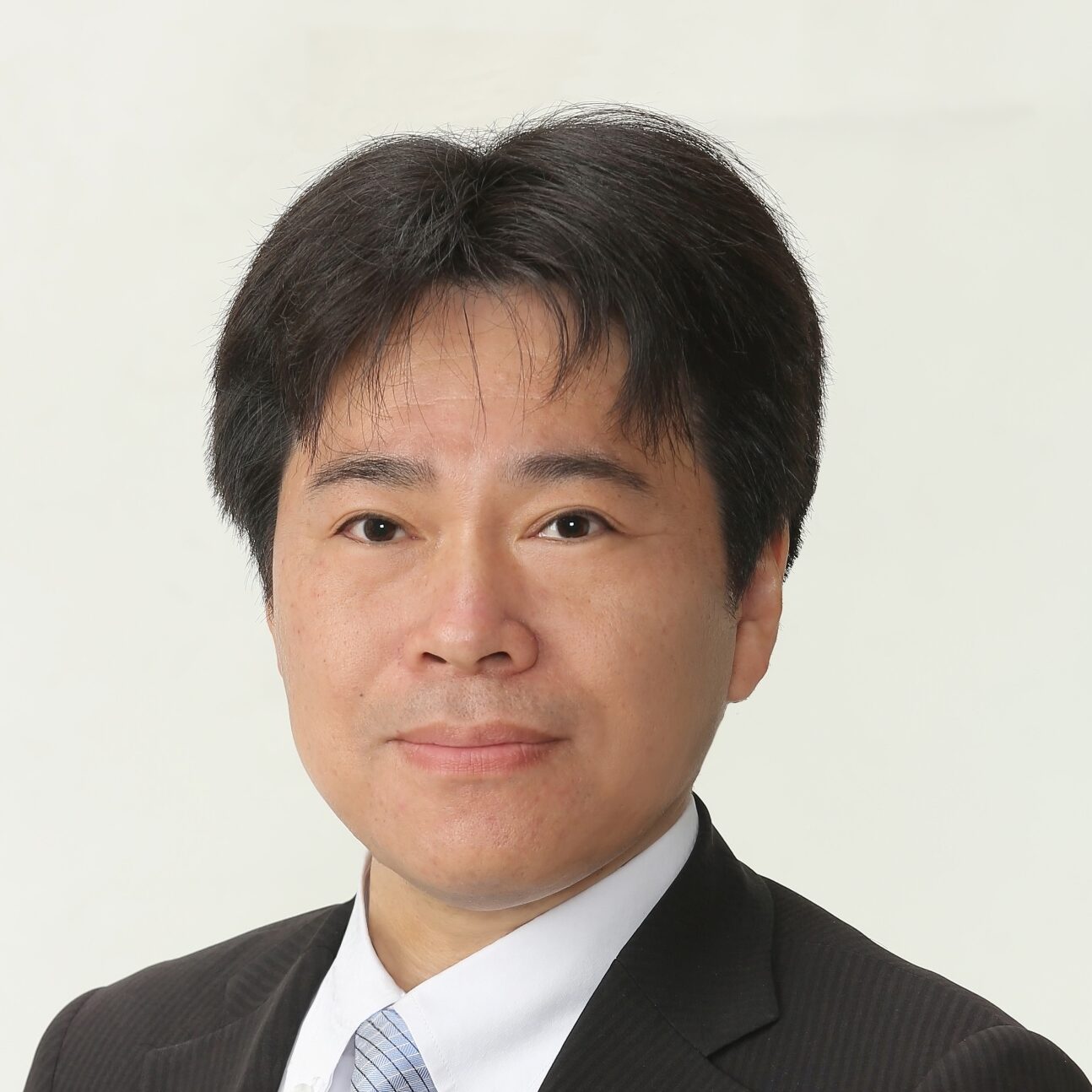 十川 祐一の顔写真
