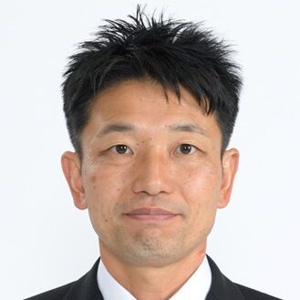 都築 信雄の顔写真